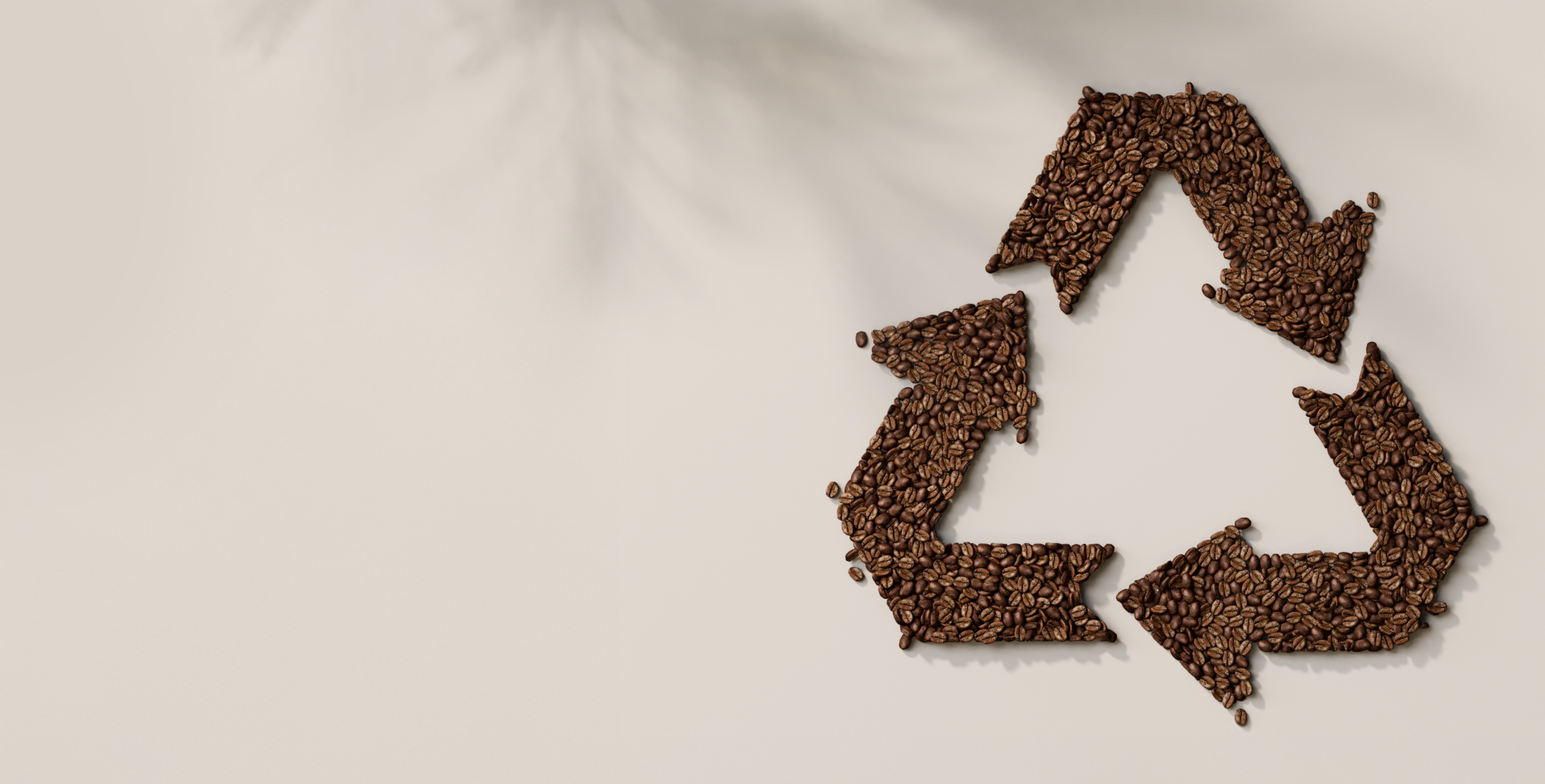 Recycling symbol made from coffee beans Recycling symbol made from coffee beans